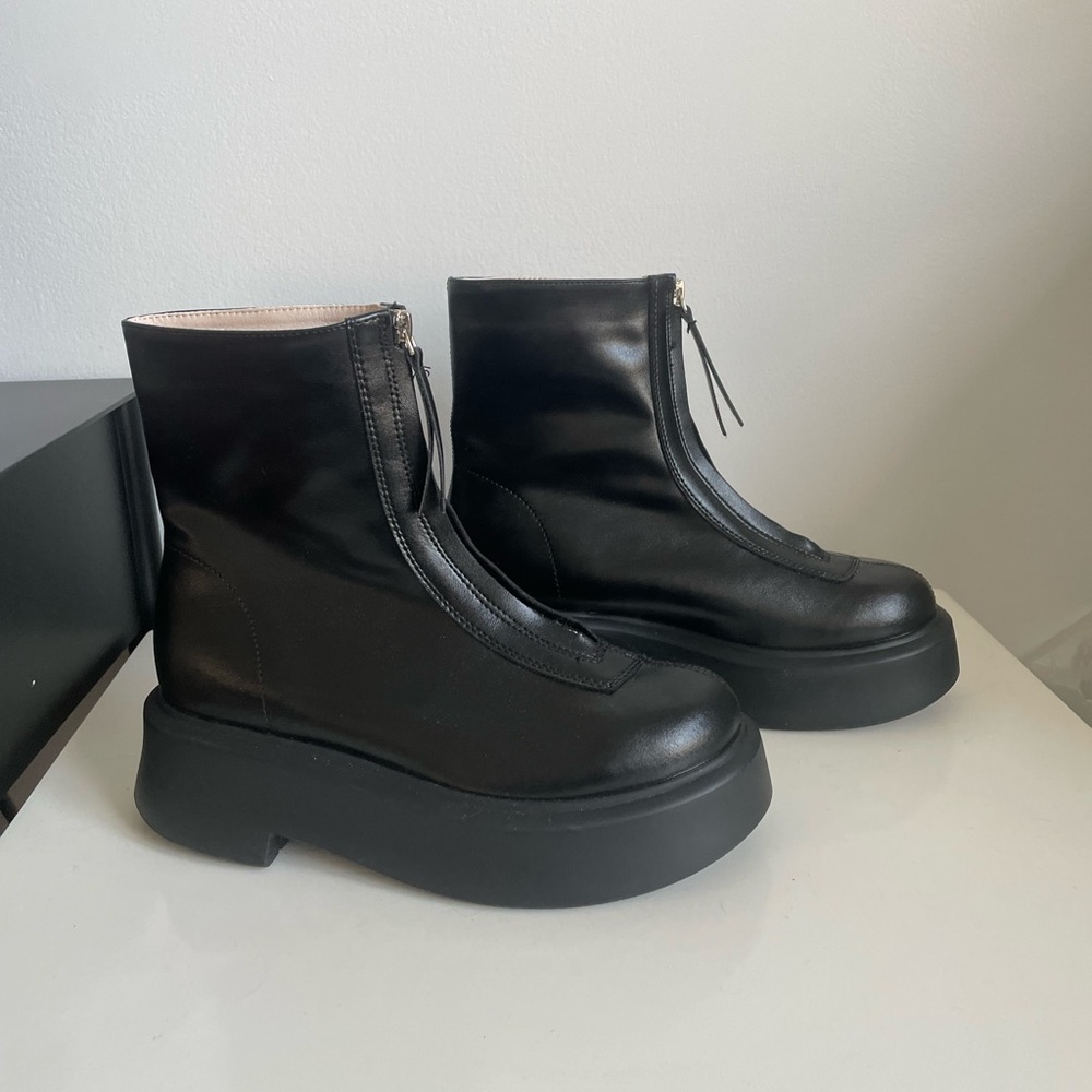 Genuine leather zip up boots. Similar to the row boots.